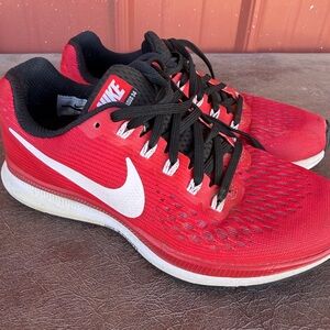 Nike Red and White Running Sneakers with Black Accents